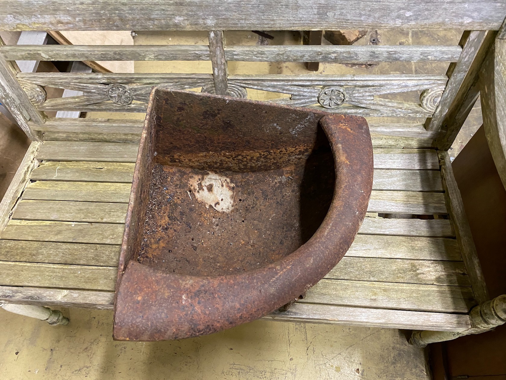 A Victorian cast iron corner trough, length 65cm, width 47cm, height 29cm